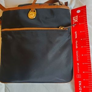 MK pocket crossbody